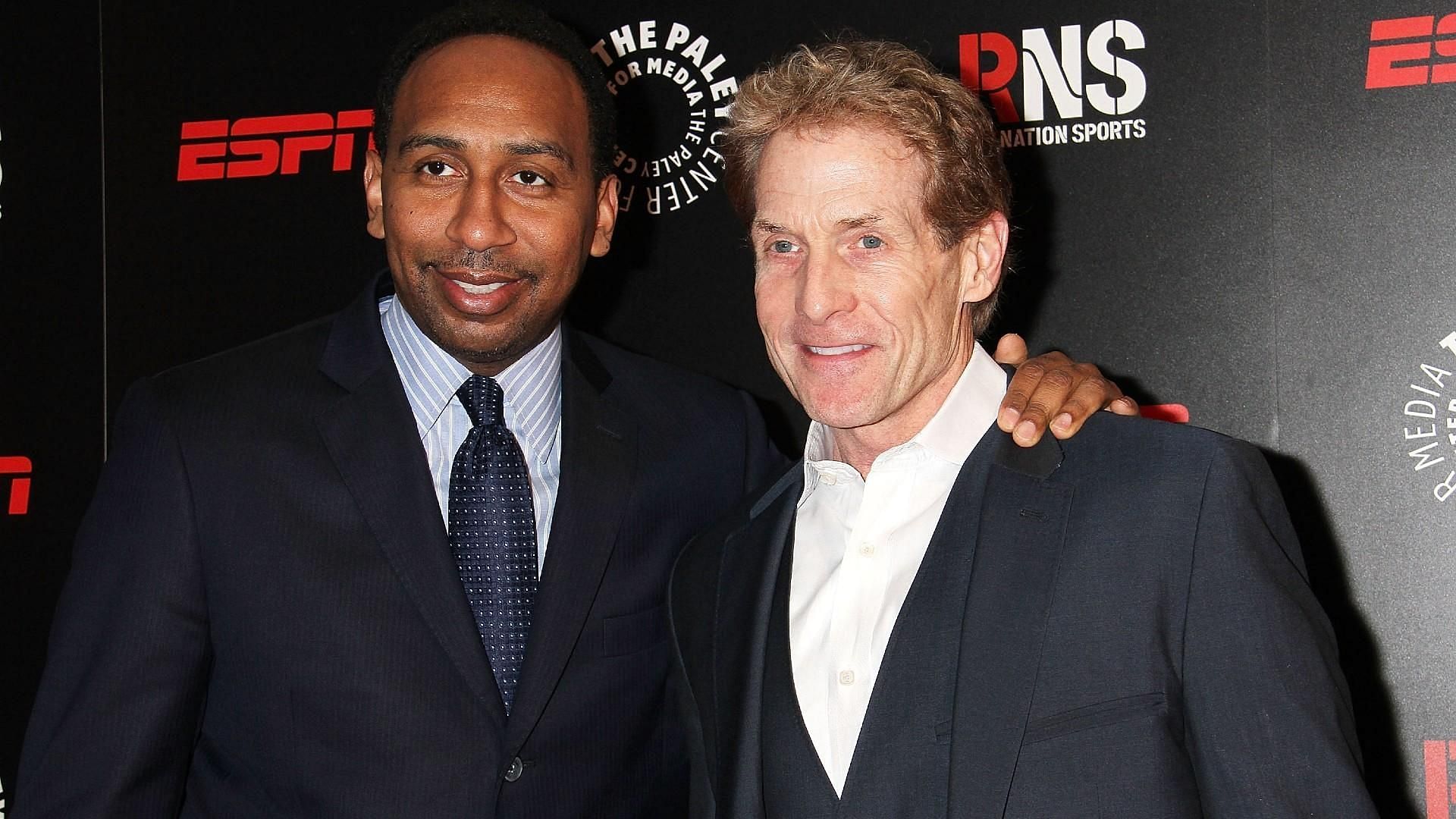 Stephen A. and Skip attending an event.